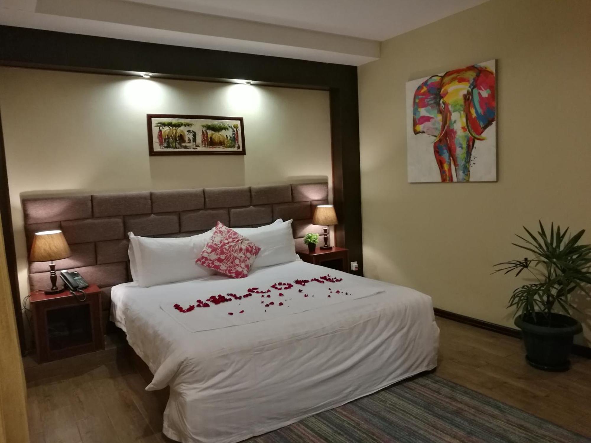Great Wall Hotel Дар ес Саалам Стая снимка