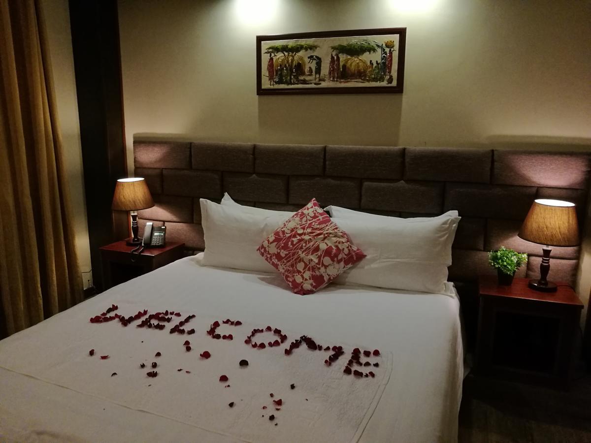 Great Wall Hotel Дар ес Саалам Стая снимка